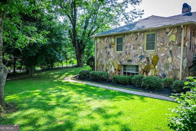 508 College St, Bowdon, GA 30108 - view of side of home with stone siding and a yard