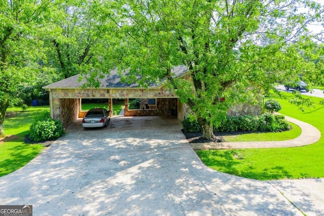 508 College St, Bowdon, GA 30108 - view of front of property with stone siding, driveway, and a front yard