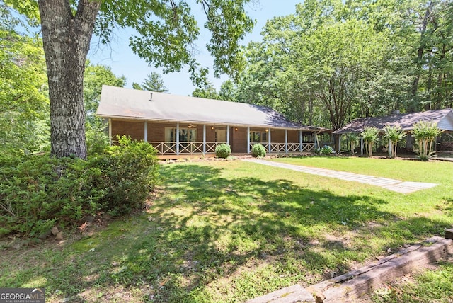 290 Bear Cave Trl, Lakemont, GA 30552 - ranch-style house featuring a porch and a front yard