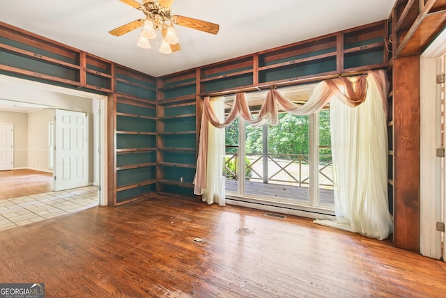 290 Bear Cave Trl, Lakemont, GA 30552 - empty room with ceiling fan and wood finished floors