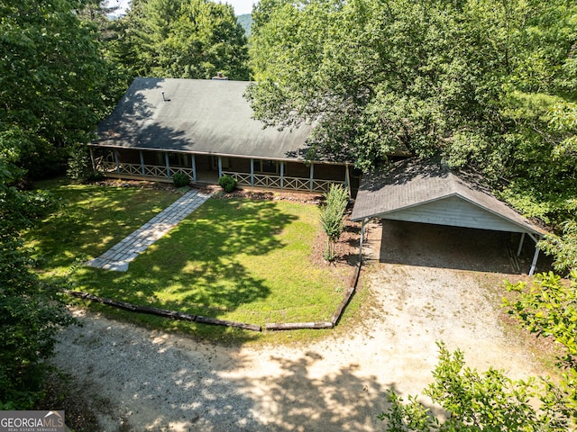 290 Bear Cave Trl, Lakemont, GA 30552 - view of front of home featuring a porch, dirt driveway, a front yard, and a carport
