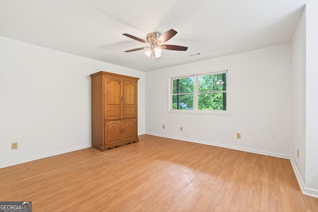 290 Bear Cave Trl, Lakemont, GA 30552 - unfurnished bedroom with light wood finished floors and ceiling fan