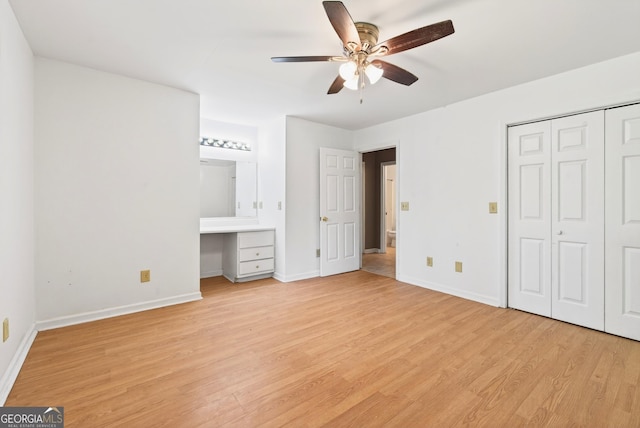 290 Bear Cave Trl, Lakemont, GA 30552 - unfurnished bedroom featuring light wood-type flooring, a closet, and ceiling fan