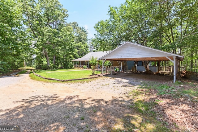 290 Bear Cave Trl, Lakemont, GA 30552 - exterior space featuring a carport, dirt driveway, and a front yard