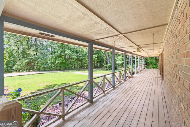 290 Bear Cave Trl, Lakemont, GA 30552 - wooden terrace featuring a yard