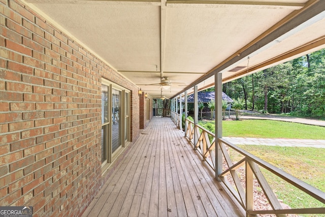 290 Bear Cave Trl, Lakemont, GA 30552 - porch with a ceiling fan and a yard