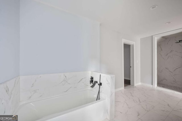 1630 Ezra Church Dr NW, Atlanta, GA 30314 - bathroom with marble finish flooring and a garden tub