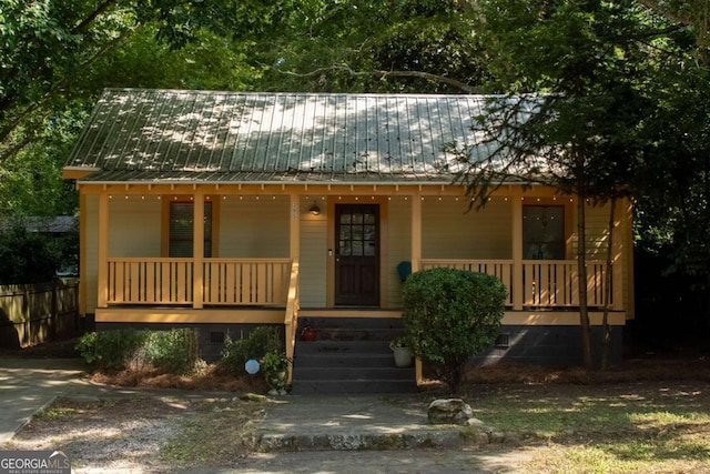 395 Cleveland Ave, Athens, GA 30601 - view of front of house with covered porch, crawl space, and a metal roof