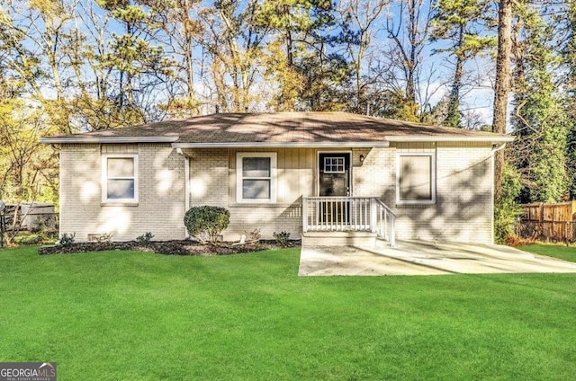 3645 Croft Pl NW, Atlanta, GA 30331 - ranch-style home with brick siding, a shingled roof, and a patio