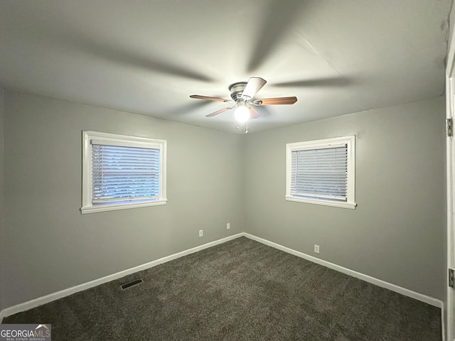 3645 Croft Pl NW, Atlanta, GA 30331 - empty room with a ceiling fan and dark carpet