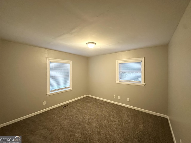 3645 Croft Pl NW, Atlanta, GA 30331 - unfurnished room with baseboards and dark colored carpet