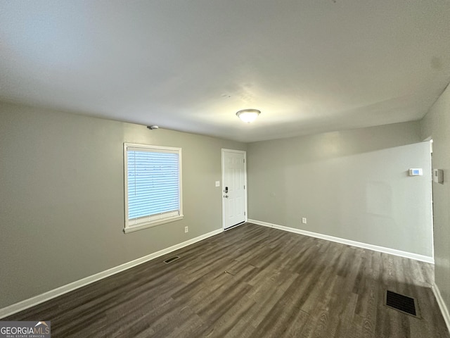 3645 Croft Pl NW, Atlanta, GA 30331 - empty room featuring dark wood-style floors and baseboards