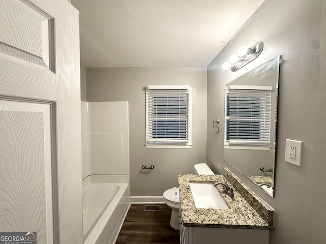 3645 Croft Pl NW, Atlanta, GA 30331 - full bath featuring wood finished floors, vanity, and shower / bathtub combination
