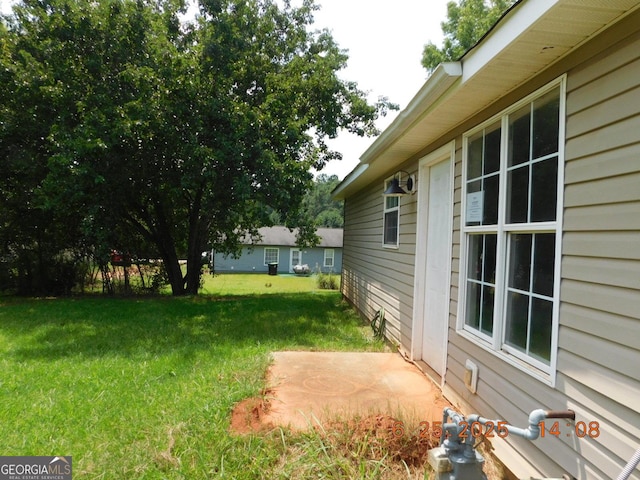 132 Park Pl, Barnesville, GA 30204 - view of green lawn with a patio