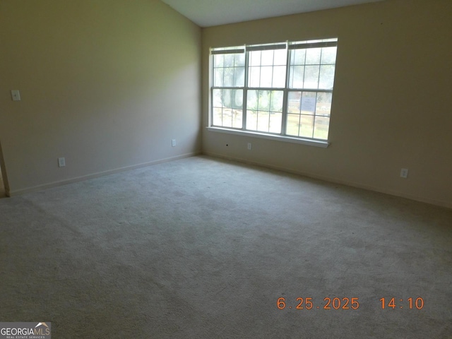 132 Park Pl, Barnesville, GA 30204 - carpeted empty room featuring baseboards