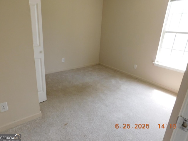 132 Park Pl, Barnesville, GA 30204 - carpeted empty room with baseboards