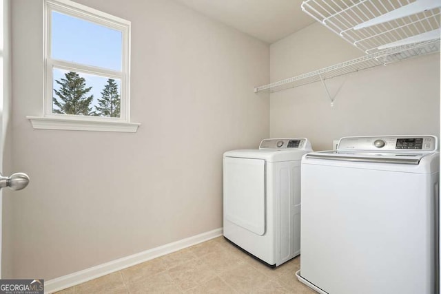 6665 Flagstone Ct, Cumming, GA 30028 - laundry room featuring washer and clothes dryer and baseboards