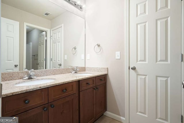 6665 Flagstone Ct, Cumming, GA 30028 - full bath with double vanity and tile patterned floors