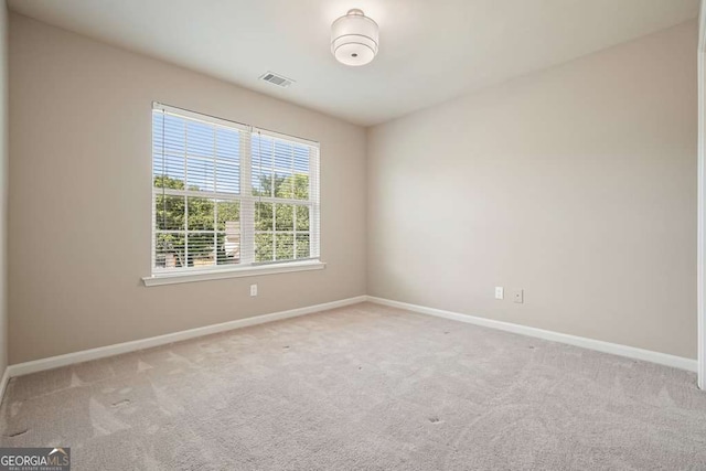 6665 Flagstone Ct, Cumming, GA 30028 - spare room featuring baseboards and carpet flooring