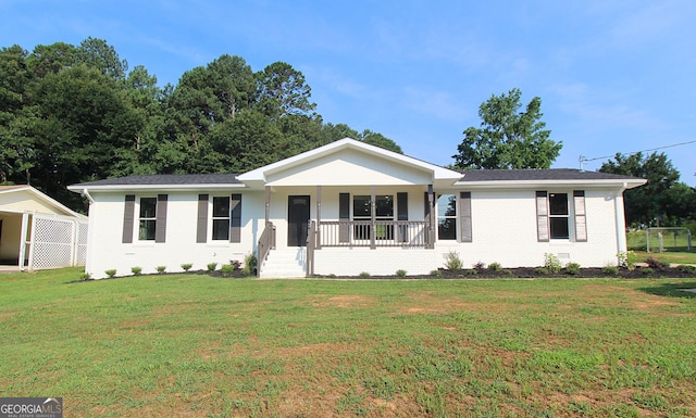 413 Spring Village Rd SE, Lindale, GA 30147 - single story home featuring covered porch, brick siding, and a front yard