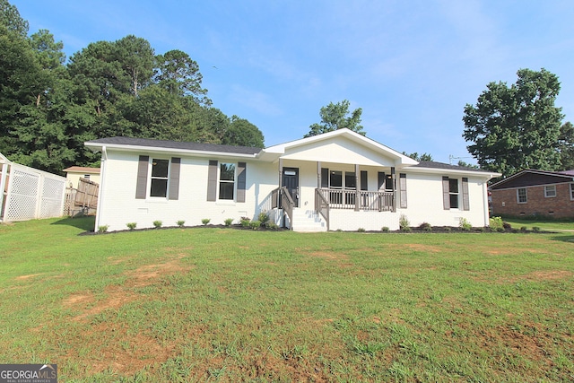 413 Spring Village Rd SE, Lindale, GA 30147 - single story home with a porch and brick siding