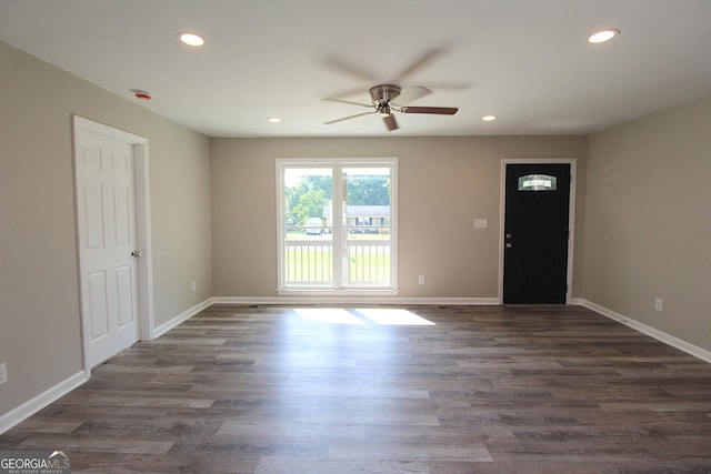 413 Spring Village Rd SE, Lindale, GA 30147 - unfurnished room with ceiling fan, recessed lighting, dark wood-style floors, and a smoke detector