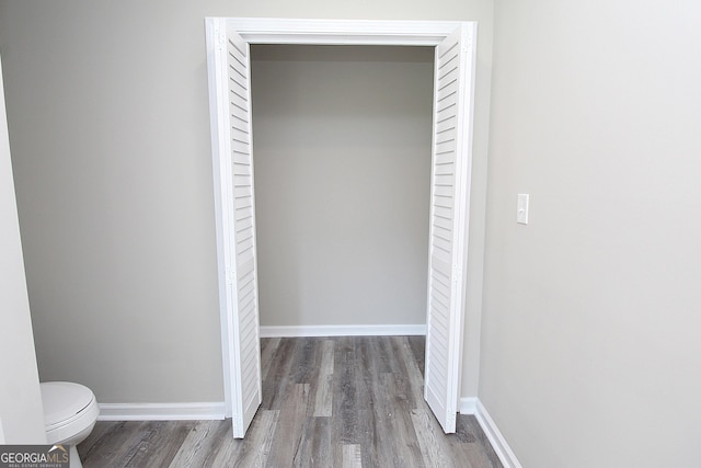 413 Spring Village Rd SE, Lindale, GA 30147 - corridor featuring wood finished floors and baseboards