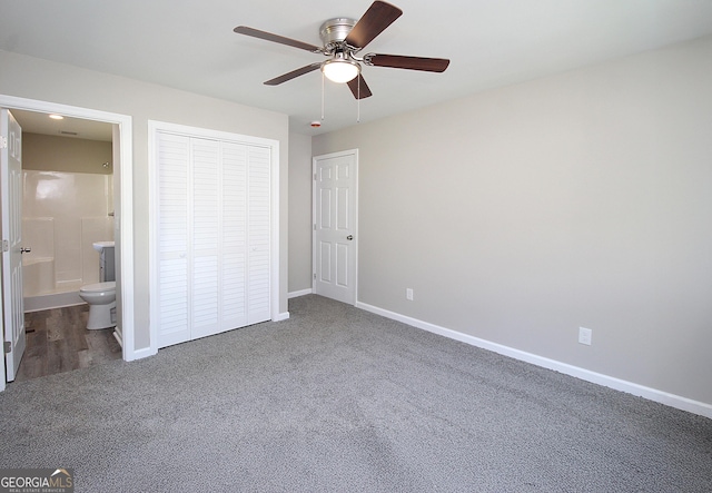 413 Spring Village Rd SE, Lindale, GA 30147 - unfurnished bedroom featuring carpet, a closet, ensuite bathroom, and ceiling fan