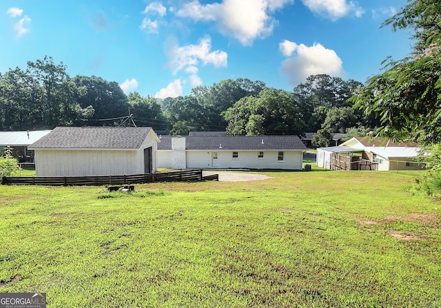 413 Spring Village Rd SE, Lindale, GA 30147 - back of house featuring an outdoor structure