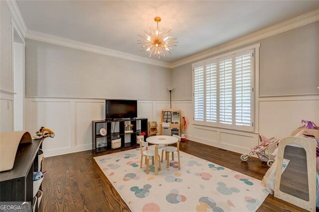 6863 Lake Sterling, Flowery Branch, GA 30542 - rec room featuring a decorative wall, wood finished floors, a chandelier, crown molding, and a wainscoted wall