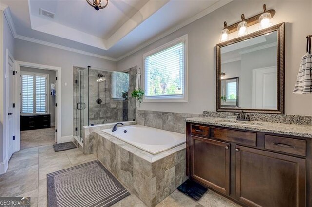 6863 Lake Sterling, Flowery Branch, GA 30542 - bathroom with a shower stall, a bath, vanity, ornamental molding, and tile patterned flooring