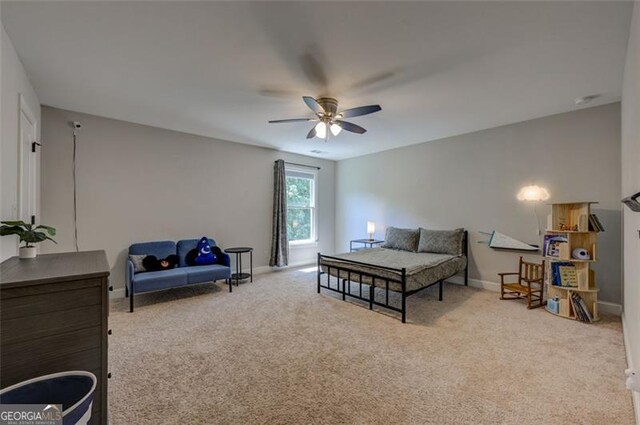 6863 Lake Sterling, Flowery Branch, GA 30542 - carpeted bedroom with baseboards and a ceiling fan