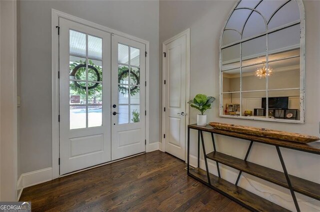 6863 Lake Sterling, Flowery Branch, GA 30542 - foyer with french doors and dark wood-style floors