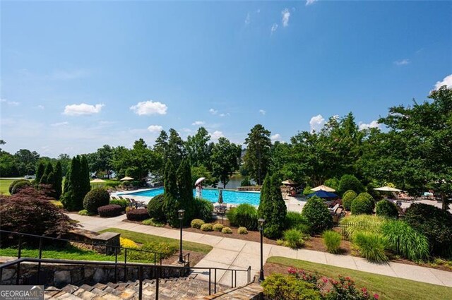 6863 Lake Sterling, Flowery Branch, GA 30542 - community pool with view of scattered trees