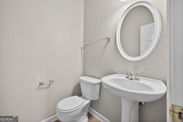 591 Wendlebury Ct, Alpharetta, GA 30004 - half bath with toilet and baseboards