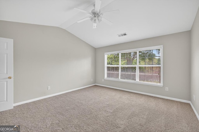 591 Wendlebury Ct, Alpharetta, GA 30004 - unfurnished room featuring vaulted ceiling, carpet flooring, and a ceiling fan