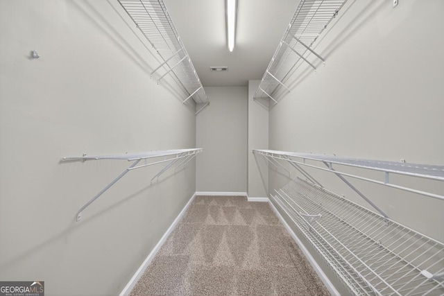 591 Wendlebury Ct, Alpharetta, GA 30004 - spacious closet featuring carpet