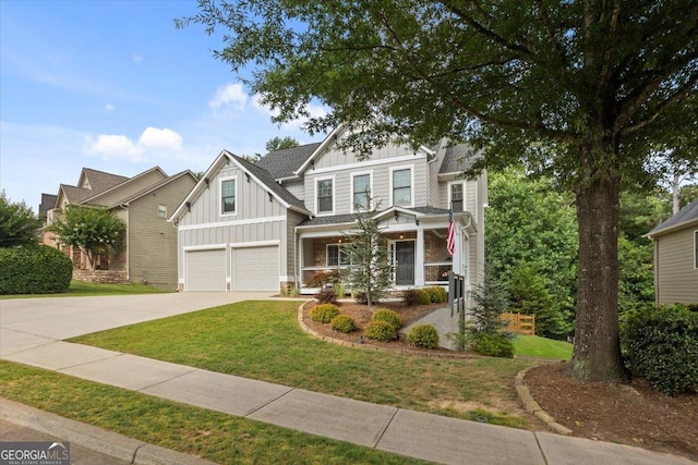 428 Gold Xing, Canton, GA 30114 - craftsman house featuring board and batten siding, concrete driveway, a garage, and a front yard