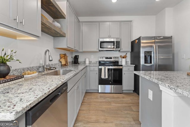 235 Ivey Ter, Temple, GA 30179 - kitchen with appliances with stainless steel finishes, gray cabinets, open shelves, light wood-style floors, and recessed lighting