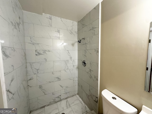 2644 Connally Dr, East Point, GA 30344 - bathroom with a tile shower and marble finish flooring