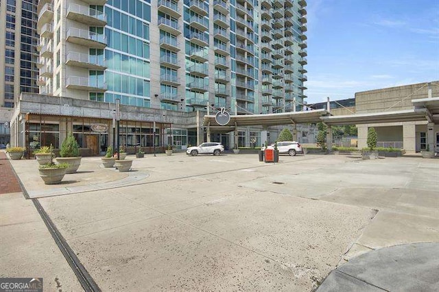361 17th St Unit 910, Atlanta, GA 30363 - view of property featuring uncovered parking