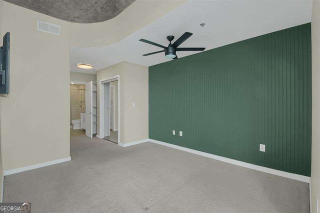 361 17th St Unit 910, Atlanta, GA 30363 - unfurnished bedroom featuring connected bathroom, a closet, and ceiling fan
