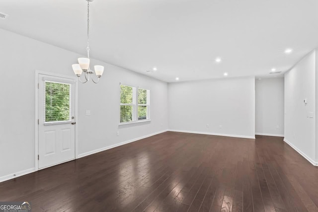 400 Paulownia Cir, Mcdonough, GA 30253 - unfurnished dining area featuring a chandelier, dark wood-style floors, and recessed lighting