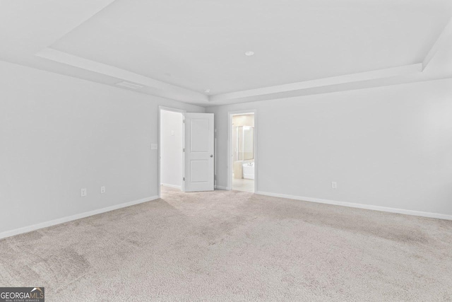 400 Paulownia Cir, Mcdonough, GA 30253 - empty room with a tray ceiling and carpet