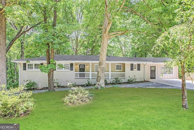 4329 Parkview Dr, Lithia Springs, GA 30122 - ranch-style house with a front yard, a porch, and stucco siding