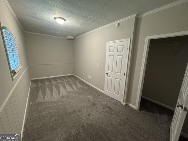 4329 Parkview Dr, Lithia Springs, GA 30122 - unfurnished bedroom featuring crown molding, carpet, and a textured ceiling