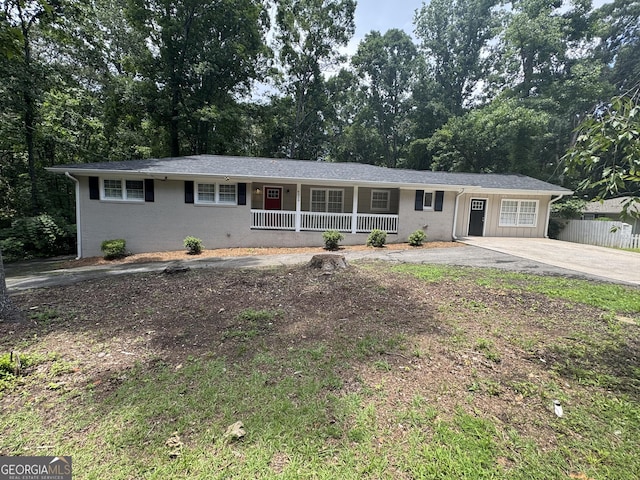 4329 Parkview Dr, Lithia Springs, GA 30122 - ranch-style house with a porch and driveway