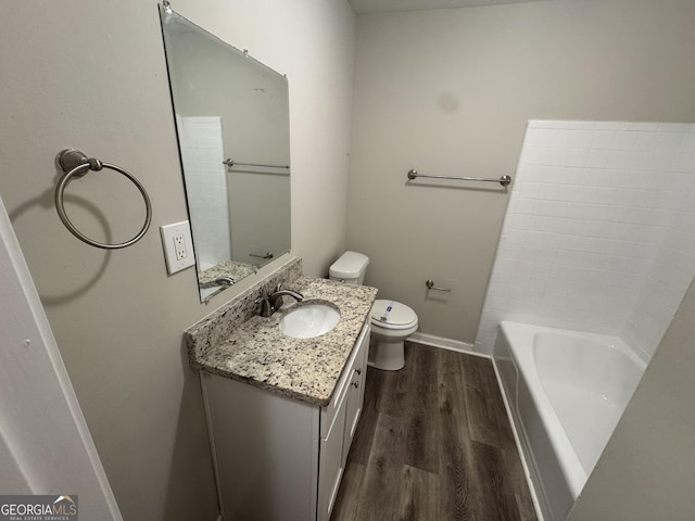 4329 Parkview Dr, Lithia Springs, GA 30122 - full bathroom with wood finished floors, vanity, and a bath