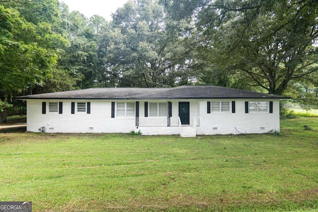 745 Kingsbridge Rd, Carrollton, GA 30117 - single story home featuring crawl space, a front lawn, view of scattered trees, and covered porch
