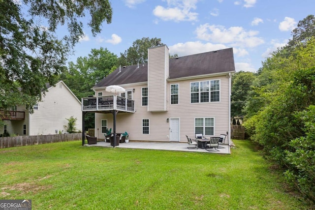 2140 Hurt Rd SW, Marietta, GA 30008 - rear view of property featuring a patio, a chimney, and a balcony